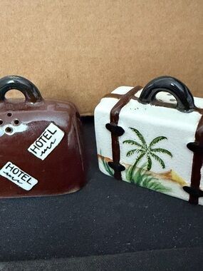 Vintage ceramic salt and pepper shakers shaped like travel luggage and suitcases